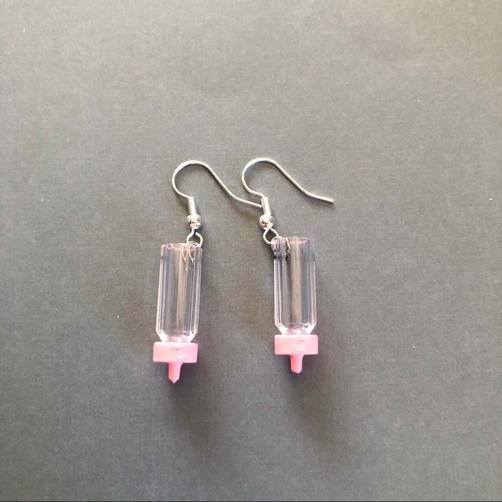 Pink baby bottle earrings